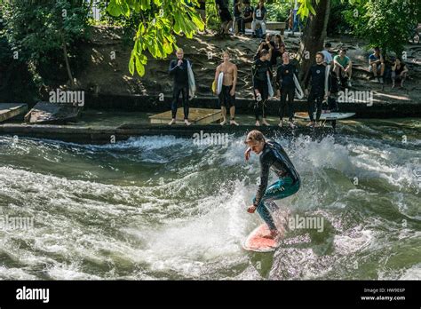 Surfing The Eisbach River In Englischer Garten Munich Germany Stock