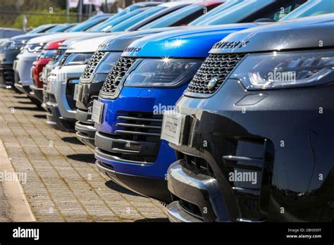 Used Land Rover discovery motor cars for sale in a garage forecourt, Ayr, Scotland Stock Photo ...