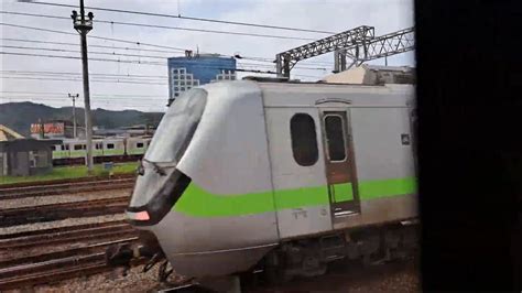 175次花蓮發車經由山線開往潮州的，七堵站→汐止站路程景，1202次新竹發車經由西部幹線開往基隆的銀綠色微笑號emu900型十輛一編組