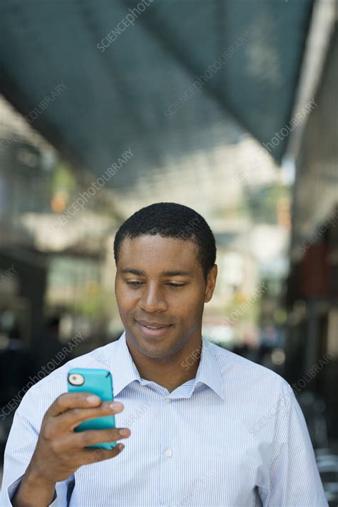 Man Checking His Phone For Messages Stock Image F008 4369 Science