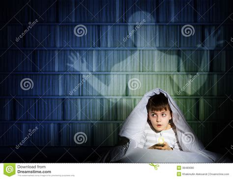 Boy Under The Covers With A Flashlight Stock Photo Image Of Evil