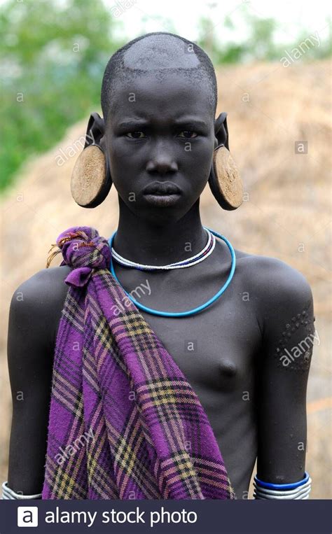 Pin On Mursi Tribe Woman