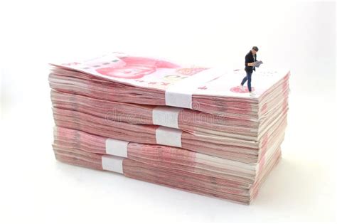 Figure Man Walk On The Stacks Of Chinese Yuan Banknotes Stock Image