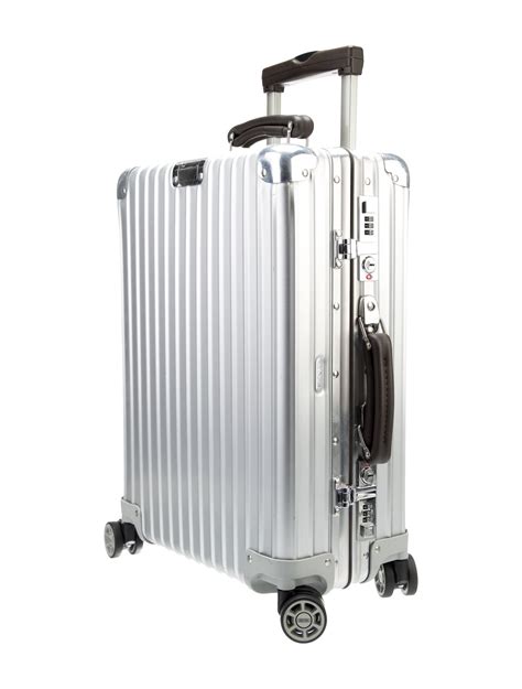 Rimowa Aluminum Rolling Suitcase Metallic Luggage And Travel