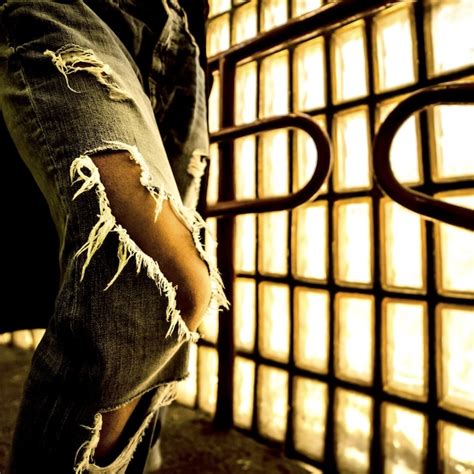 Premium Photo | Torn jeans. urban fashion style