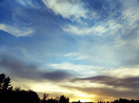 Sunset With Cirrus Clouds And Saharan Dust In The Air Stock Image