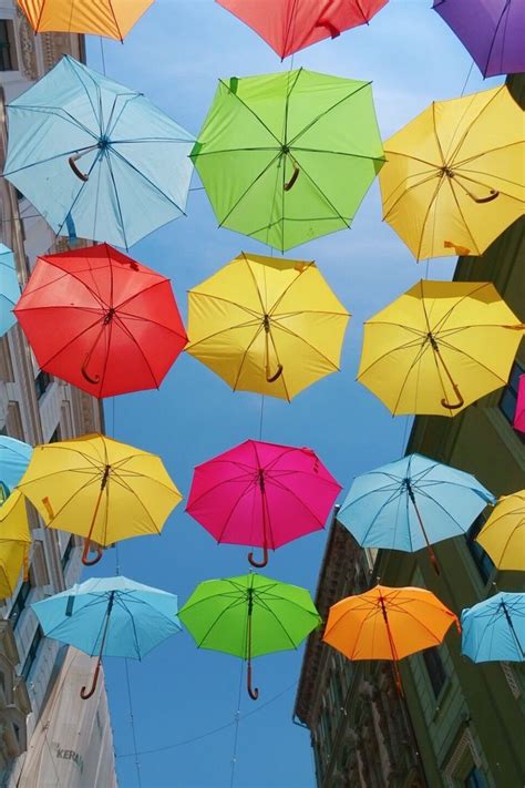 Many Multicolored Umbrellas Are Hanging In The Air