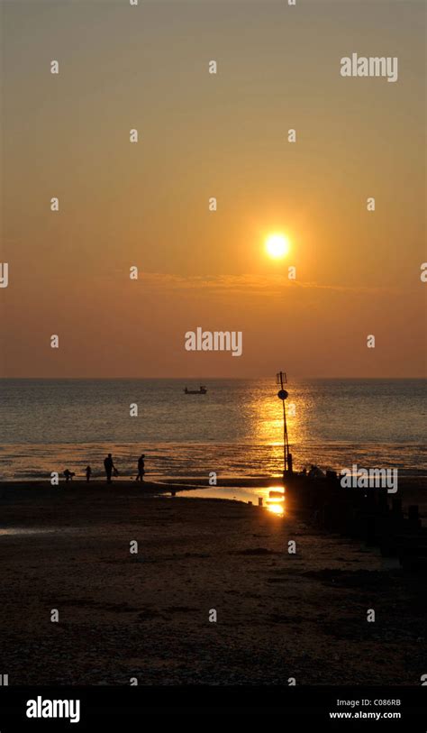 Sunset Over The Wash On Hunstanton Beach In Norfolk Uk Stock Photo Alamy