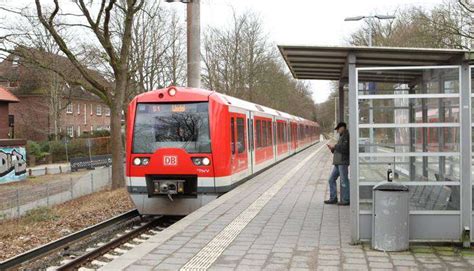 An S Bahn Of The Line S1 In The Direction Of Wedel Enters The Station