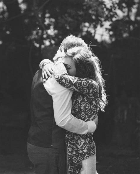 Black And White Photo Of Couple Embracing Each Other