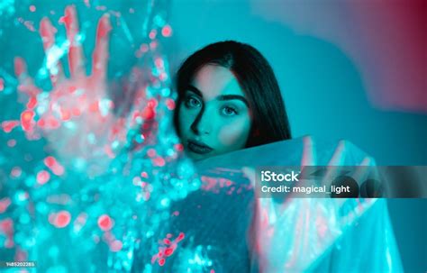 High Fashion Model Woman In Colorful Bright Neon Blue And Purple Lights