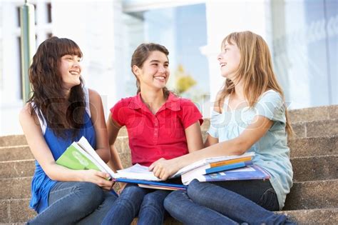 Group Of Teenage Female Friends Sitting ... | Stock image | Colourbox