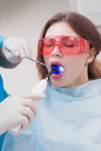 Premium Photo Doctor Orthodontist Examines The Patient After Brushing