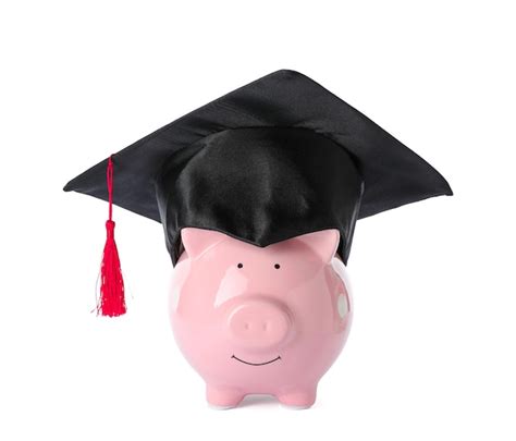 Premium Photo Piggy Bank With Graduation Hat Isolated On White