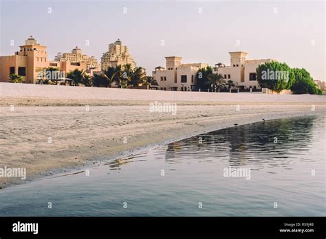 Al Hamra Village and Beach at Sunrise Stock Photo - Alamy