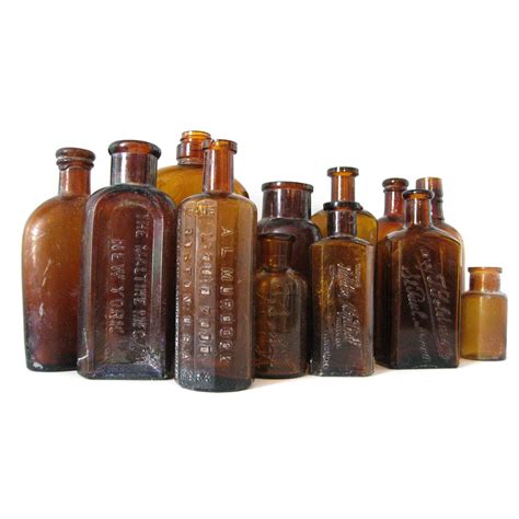 13 Antique Brown Glass Bottles