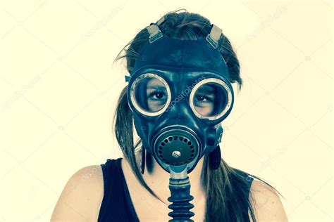 Young girl wearing gas mask Stock Photo by ©pxhidalgo 51192929