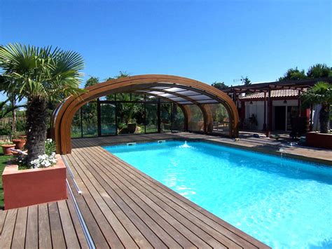 Copertura per piscina alta - ABRISUD - telescopica / in legno / con azionamento manuale