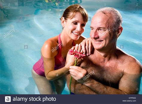 Mature Couple In Swimming Pool Stock Photos Mature Couple In Swimming Pool Stock Images Alamy