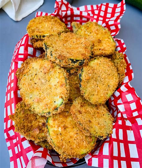 Air Fryer Zucchini Chips In A Red Basket