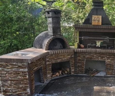 Corner Firebrick Outdoor Kitchen With Pizza Oven With Stone