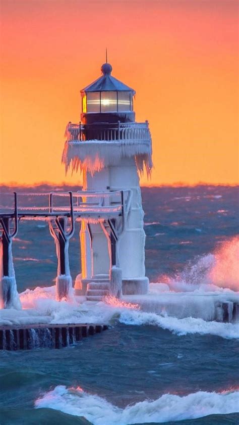 St Joseph North Pier Lighthouse In The Sunset Backiee