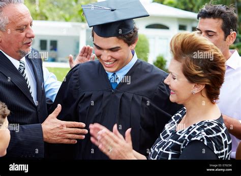 Hispanic Student And Family Celebrating Graduation Stock Photo - Alamy