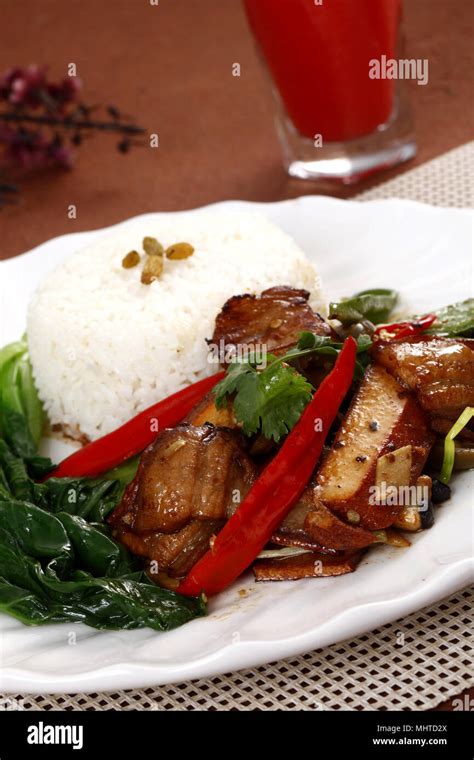 BBQ Duck over rice Stock Photo - Alamy