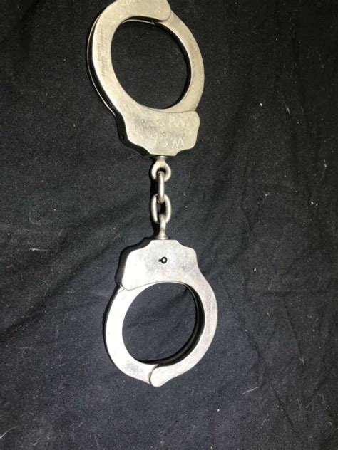 Pair Of Police Handcuffs W Key The Peerless Handcuff Co 1531451