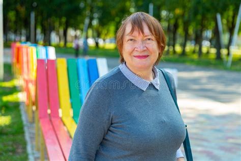 Smiling Mature Lady In Urban Park Stock Image Image Of Enjoy Handbag