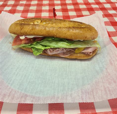 New Menu Item! **8 in Hot Subs ** - West Madison Grocery