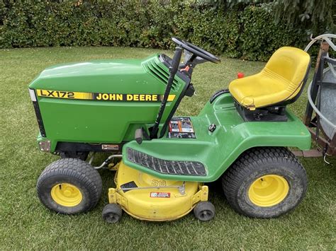 Dunkle Auction Services John Deere Lx Ride On Lawn Mower With