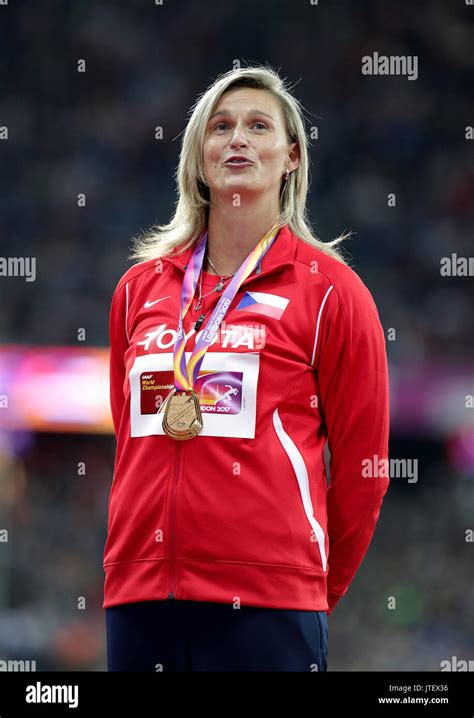 Czech Republics Barbora Spotakova Celebrates With Her Gold Medal On