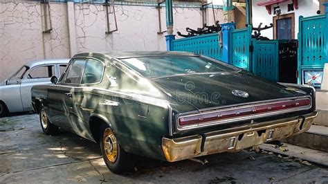 Classic Dodge Charger Parked On The Front Of House Stock Footage