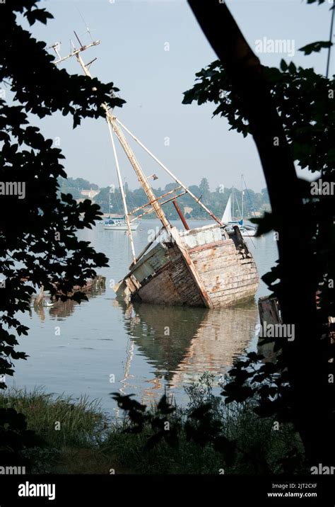 Ruined Boat On The River Orwell At Pin Mill Suffolk Uk Badly Damaged