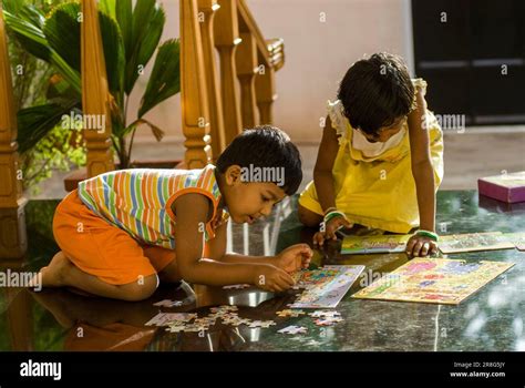 Brother Year And Sister Year Playing Puzzle Game Coimbatore