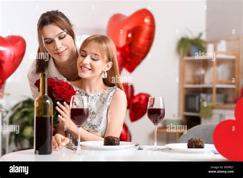 Happy Transgender Couple Celebrating Valentines Day At Home Stock