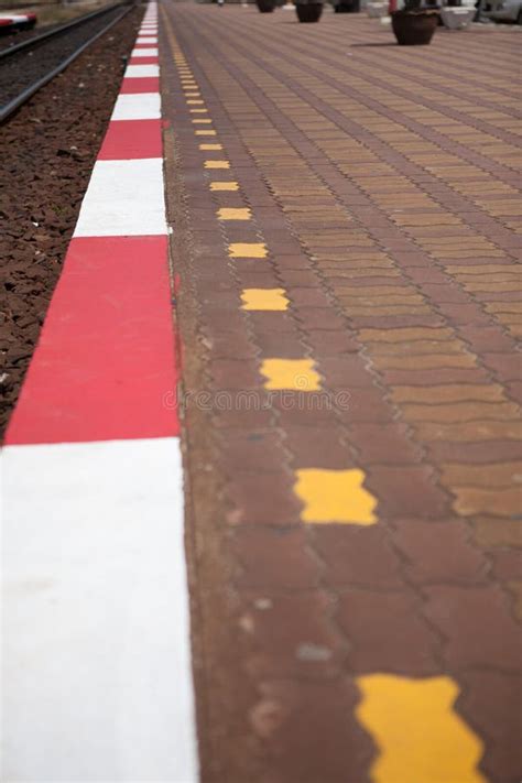 Red And White Strip Footpath Between Railway Stock Photo Image Of Sink