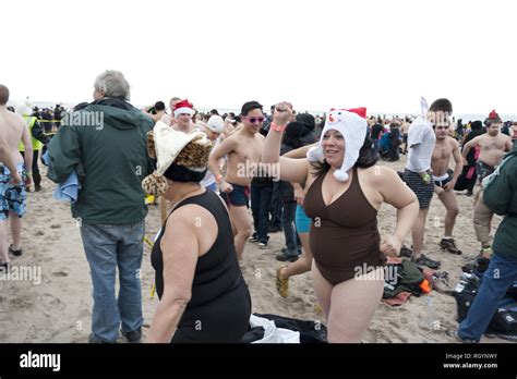 Annual Polar Bear Club New Years Day Plunge Into Atlantic Ocean At