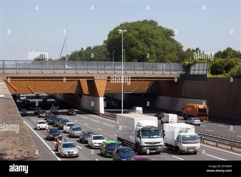 Traffic Jam Under Aquaduct Near Gouda In The Netherlands Over Highway