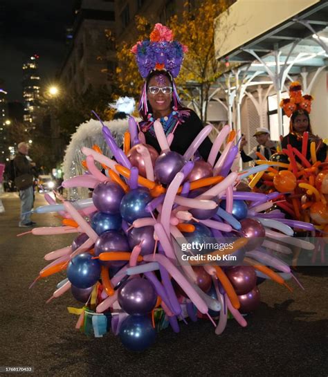 Parade goers in costume attend the 2023 New York City Halloween... News ...