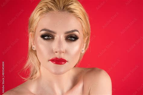 Beauty Woman With Fashion Eyes Make Up Red Lipstick On Plump Lips