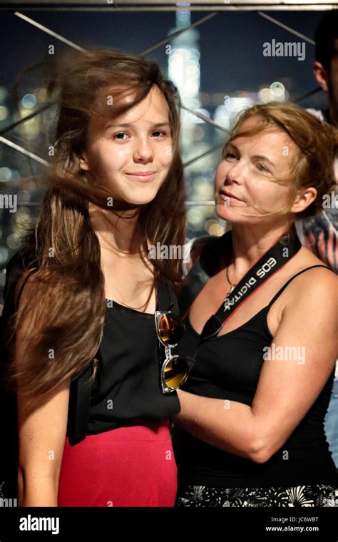 Tourists Mather And Daughter Empire State Building At Night