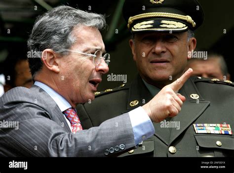 Colombia S President Alvaro Uribe Right Gestures As Gen Oscar