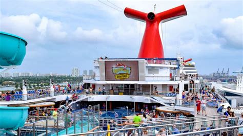 Carnival Cruise Ship Passenger Caught Sitting On Balcony Railing