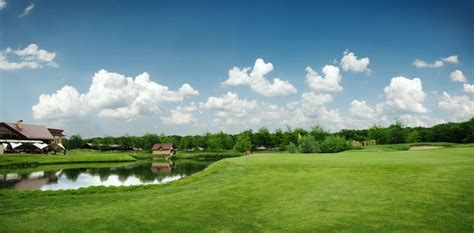 Premium Photo Green Field And Lake For Golfing Golf Course