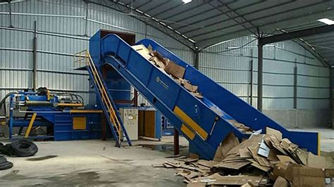 China Auto Continuous Baler Scrap Carton Baling Press Occ Baler Machine