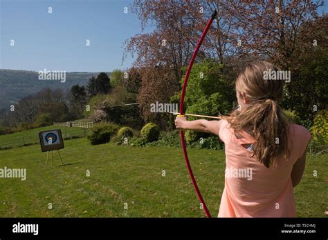 Young Girl Doing Archery Near Llangollen In Denbighshire In Wales Stock