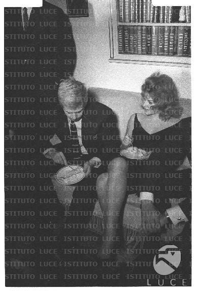 Corrado Pani With His Wife Renata Monteduro Sitting On A Sofa Total