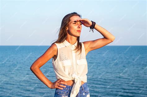 Premium Photo Beautiful Young Woman Putting Her Palm To Her Forehead